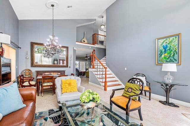 7141 Charleston Point Dr, Lake Worth, FL 33467 - living area featuring stairway, a chandelier, and a high ceiling