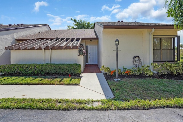 3741 English D Ln Unit D, Lake Worth, FL 33467 - property entrance featuring stucco siding