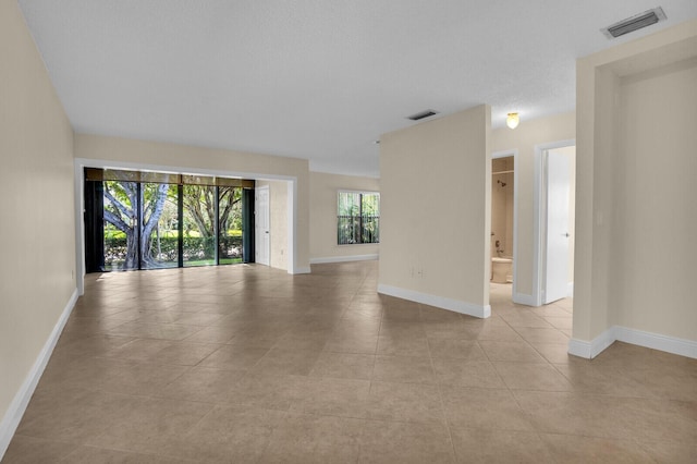 3741 English D Ln Unit D, Lake Worth, FL 33467 - unfurnished room featuring light tile patterned flooring and baseboards
