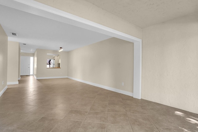 3741 English D Ln Unit D, Lake Worth, FL 33467 - unfurnished room with tile patterned flooring and a textured wall