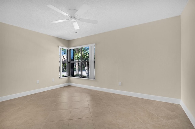 3741 English D Ln Unit D, Lake Worth, FL 33467 - empty room with light tile patterned flooring, a ceiling fan, and a textured ceiling