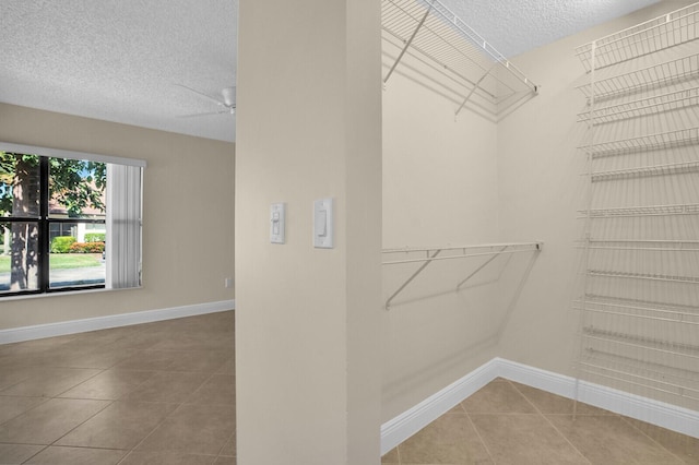 3741 English D Ln Unit D, Lake Worth, FL 33467 - spacious closet with tile patterned flooring and a ceiling fan