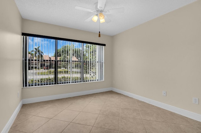 3741 English D Ln Unit D, Lake Worth, FL 33467 - unfurnished room featuring ceiling fan, light tile patterned floors, and a textured ceiling