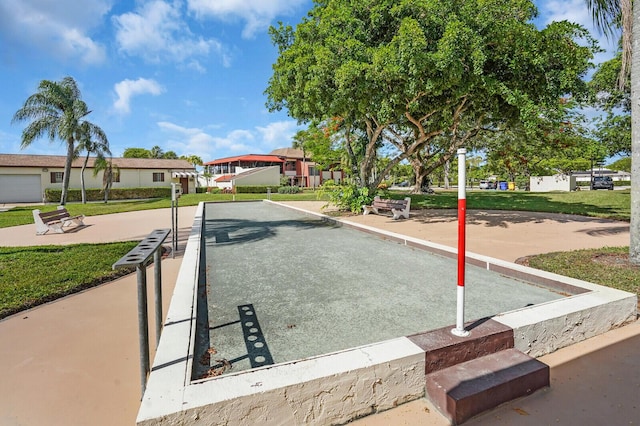 3741 English D Ln Unit D, Lake Worth, FL 33467 - view of property's community featuring a bocce ball area, a residential view, and a lawn