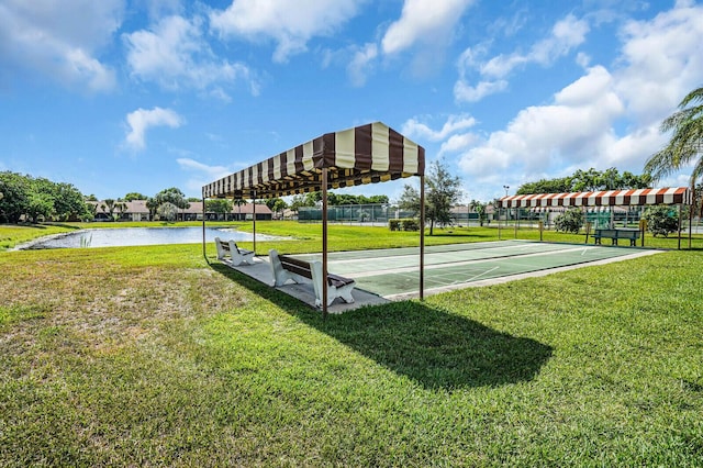 3741 English D Ln Unit D, Lake Worth, FL 33467 - view of property's community featuring shuffleboard and a lawn