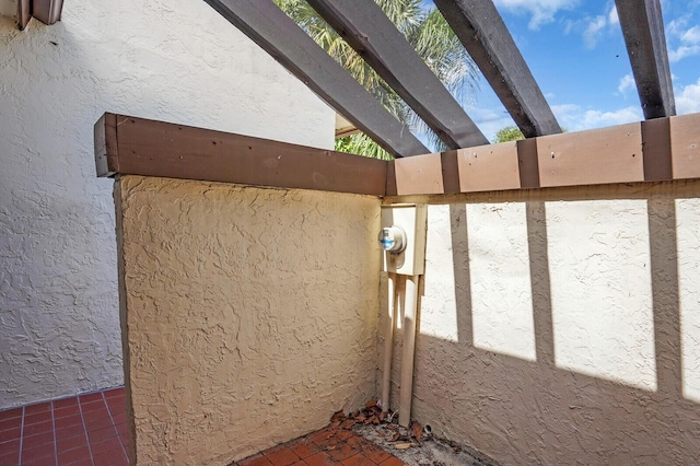 3741 English D Ln Unit D, Lake Worth, FL 33467 - exterior view of stucco siding and electric meter