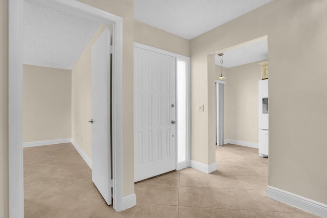 3741 English D Ln Unit D, Lake Worth, FL 33467 - entrance foyer featuring light tile patterned floors and baseboards