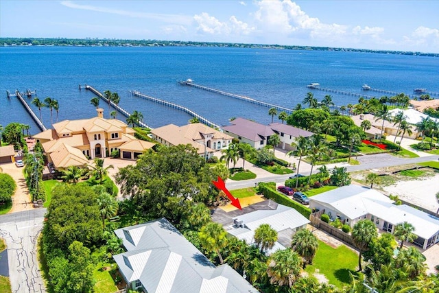 804 SE Riverside Dr, Stuart, FL 34994 - aerial perspective of suburban area featuring a large body of water