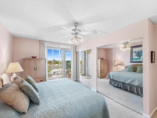 3310 S Ocean Blvd Unit 928D, Highland Beach, FL 33487 - bedroom featuring carpet floors, access to outside, ceiling fan, and a textured ceiling