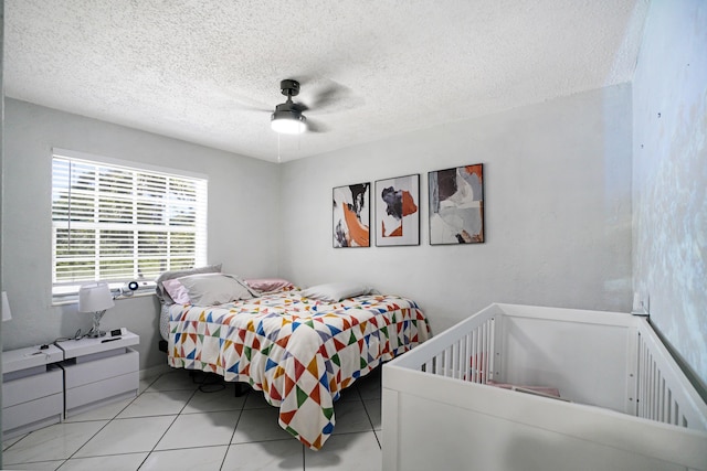 1395 SW 46 Th Ave, Fort Lauderdale, FL 33317 - bedroom featuring a textured ceiling, tile patterned floors, and a ceiling fan