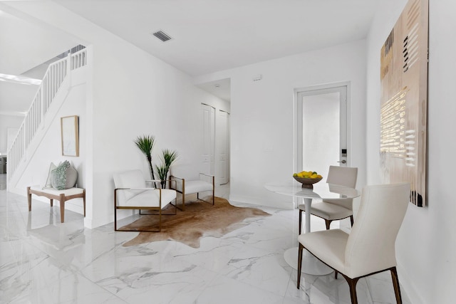 12240 SW 44th Ct, Davie, FL 33330 - sitting room with light marble finish flooring and stairs