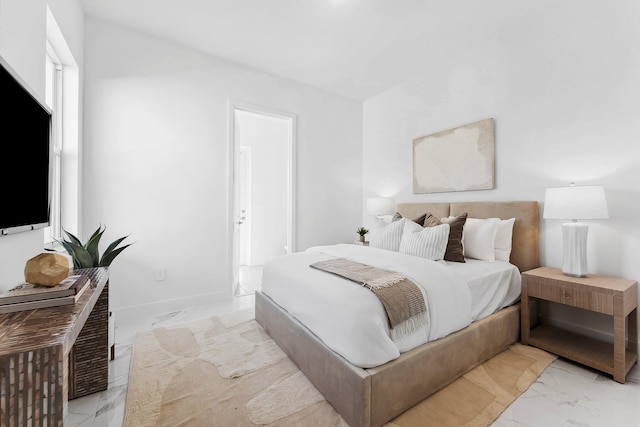 12240 SW 44th Ct, Davie, FL 33330 - bedroom with light marble finish flooring