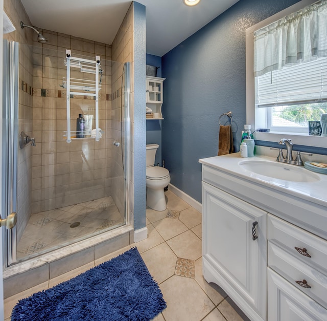 624 10th Ave N, Lake Worth Beach, FL 33460 - full bath featuring a shower stall, tile patterned flooring, and vanity
