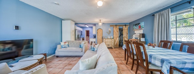 624 10th Ave N, Lake Worth Beach, FL 33460 - living area with a textured ceiling and light tile patterned flooring