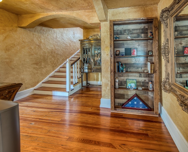 624 10th Ave N, Lake Worth Beach, FL 33460 - wine cellar with wood-type flooring, a textured wall, and arched walkways