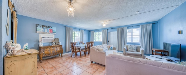 624 10th Ave N, Lake Worth Beach, FL 33460 - living area featuring a textured ceiling and light tile patterned floors