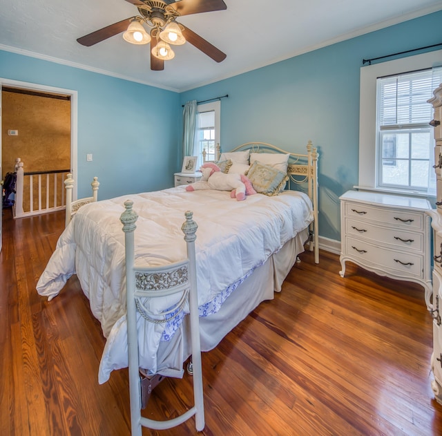 624 10th Ave N, Lake Worth Beach, FL 33460 - bedroom with hardwood / wood-style flooring, ornamental molding, and ceiling fan