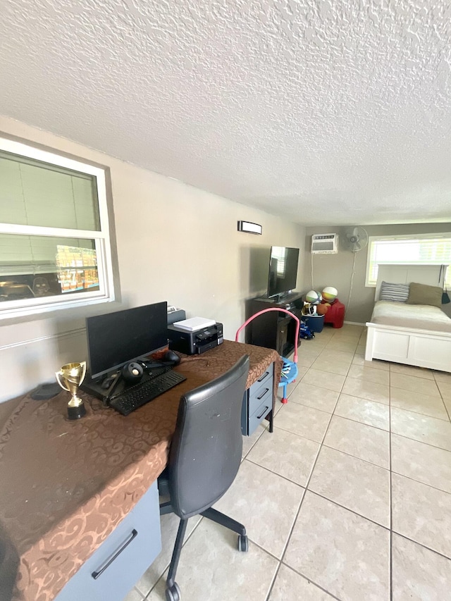 409 NE Oleander Ave, Port Saint Lucie, FL 34952 - office space with a wall unit AC, a textured ceiling, and light tile patterned flooring