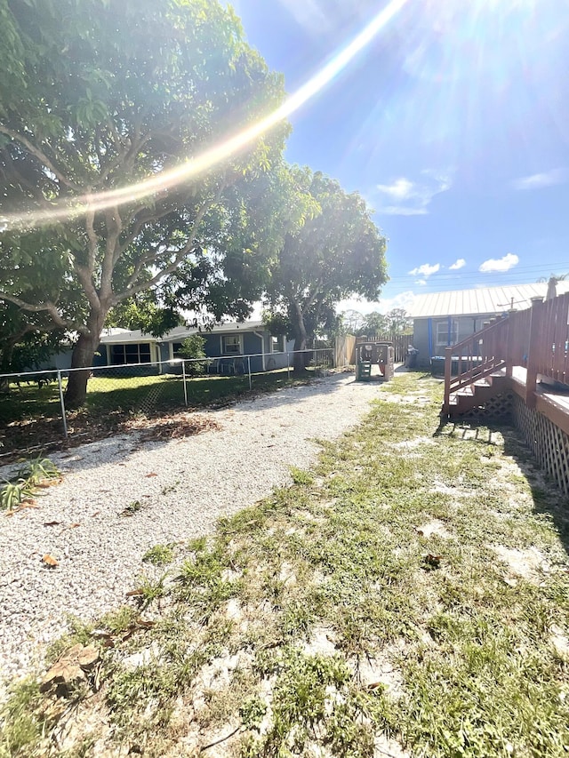 409 NE Oleander Ave, Port Saint Lucie, FL 34952 - fenced backyard featuring a shed