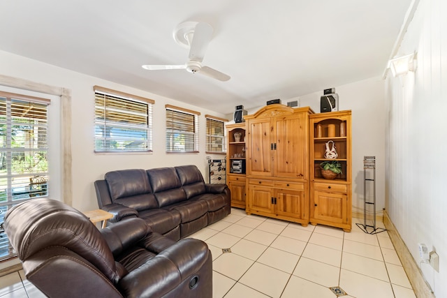 918 Grace Ave, Lake Worth, FL 33461 - living area featuring light tile patterned floors and a ceiling fan