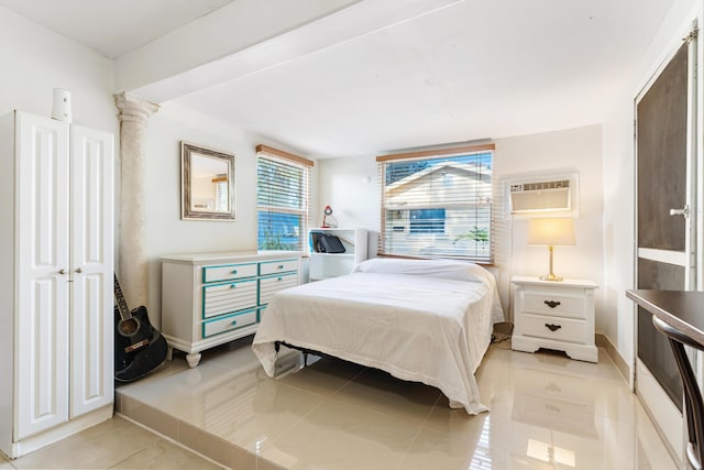 918 Grace Ave, Lake Worth, FL 33461 - bedroom with an AC wall unit and light tile patterned floors