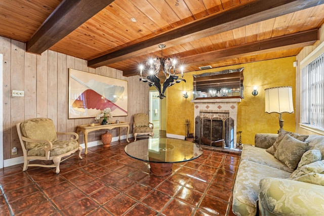 918 Grace Ave, Lake Worth, FL 33461 - living area with a wood ceiling with exposed beams, a fireplace with raised hearth, a chandelier, and wooden walls