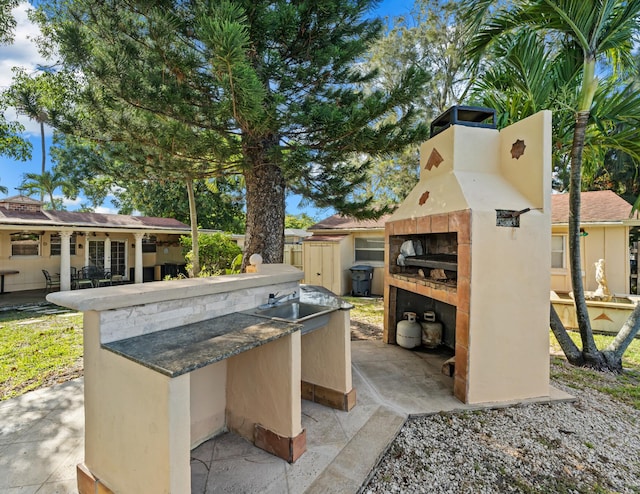 918 Grace Ave, Lake Worth, FL 33461 - view of patio with area for grilling and a sink
