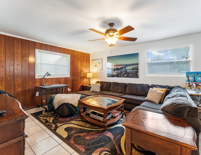 918 Grace Ave, Lake Worth, FL 33461 - living area with ceiling fan, light tile patterned floors, healthy amount of natural light, and wooden walls
