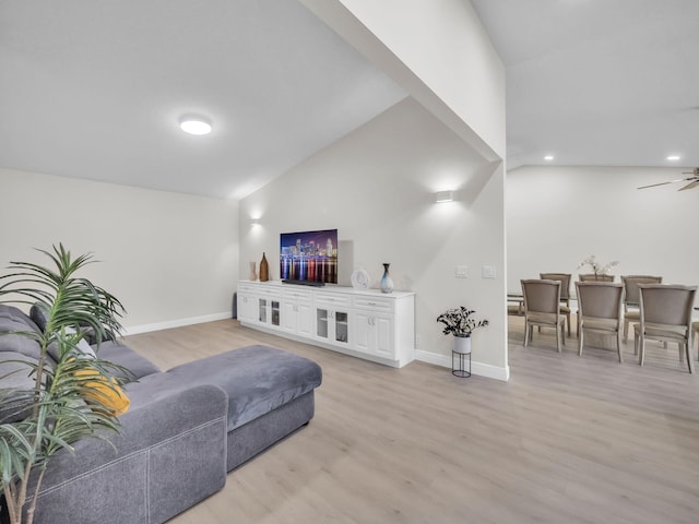 1598 SW 19th St, Boca Raton, FL 33486 - living area with vaulted ceiling, light wood finished floors, ceiling fan, and recessed lighting