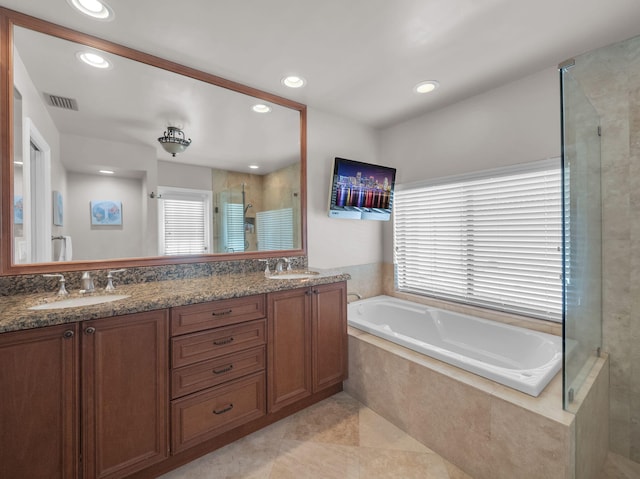 1598 SW 19th St, Boca Raton, FL 33486 - bathroom with a shower stall, a garden tub, double vanity, recessed lighting, and tile patterned floors