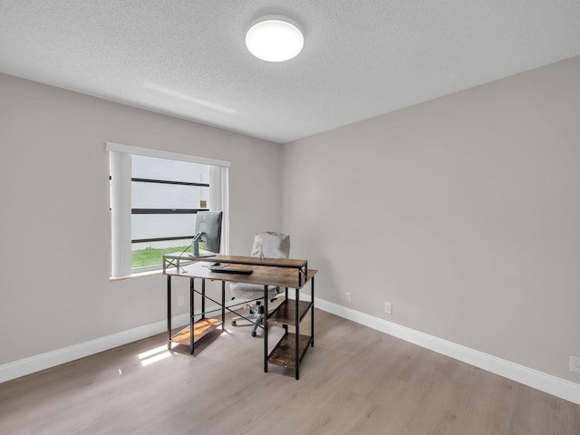 1598 SW 19th St, Boca Raton, FL 33486 - office area featuring wood finished floors and a textured ceiling