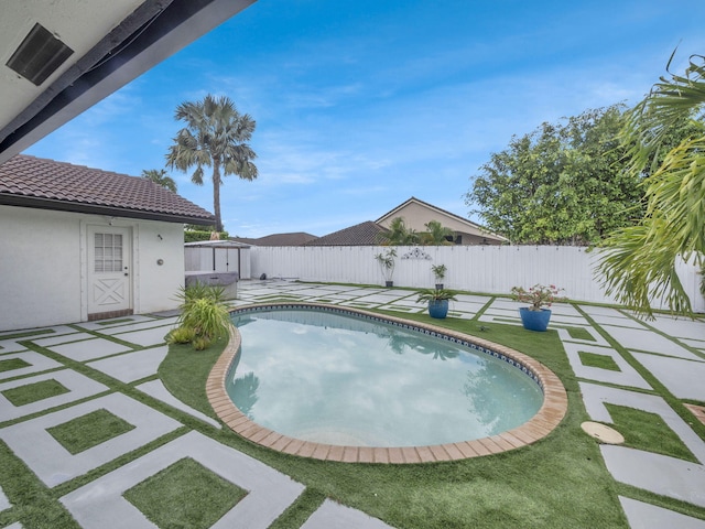 1598 SW 19th St, Boca Raton, FL 33486 - view of pool with a fenced backyard, a patio, and a storage unit