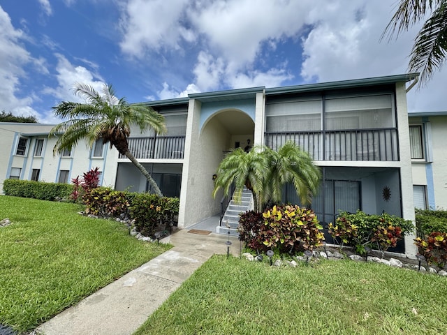 1119 Green Pine Blvd Unit C1, West Palm Beach, FL 33409 - view of building exterior featuring stairs