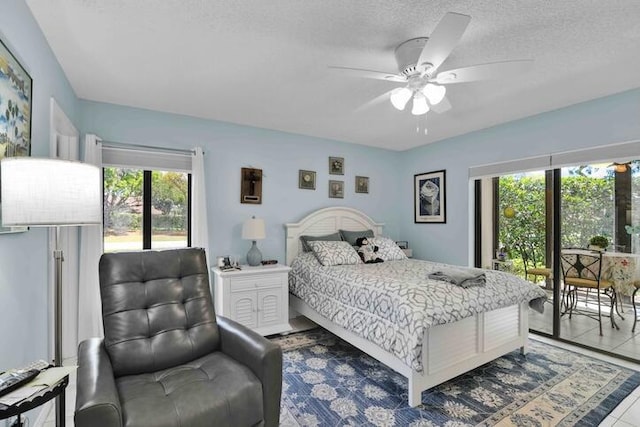 18619 Breezy Palm Way, Boca Raton, FL 33496 - bedroom with a textured ceiling, access to outside, and a ceiling fan