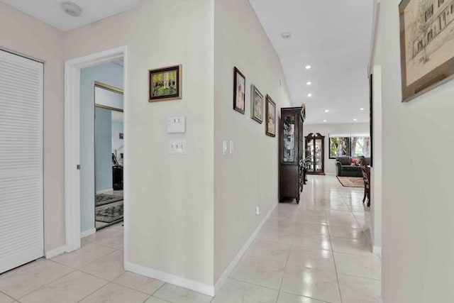 18619 Breezy Palm Way, Boca Raton, FL 33496 - corridor with recessed lighting and light tile patterned flooring