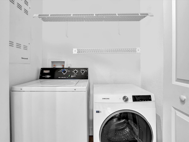 2 Renaissance Way Unit 302, Boynton Beach, FL 33426 - laundry area featuring independent washer and dryer