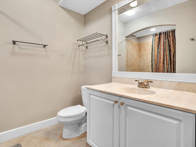 2 Renaissance Way Unit 302, Boynton Beach, FL 33426 - bathroom featuring vanity, tile patterned floors, and curtained shower