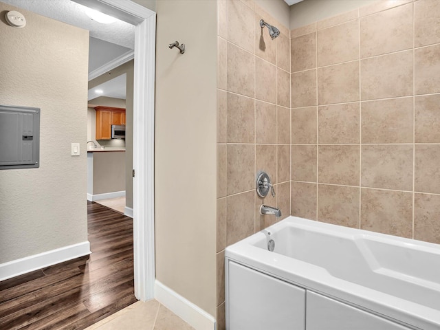2 Renaissance Way Unit 302, Boynton Beach, FL 33426 - full bath featuring shower / washtub combination, electric panel, and wood finished floors