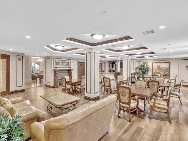 2 Renaissance Way Unit 302, Boynton Beach, FL 33426 - living area with decorative columns, light wood finished floors, coffered ceiling, and recessed lighting