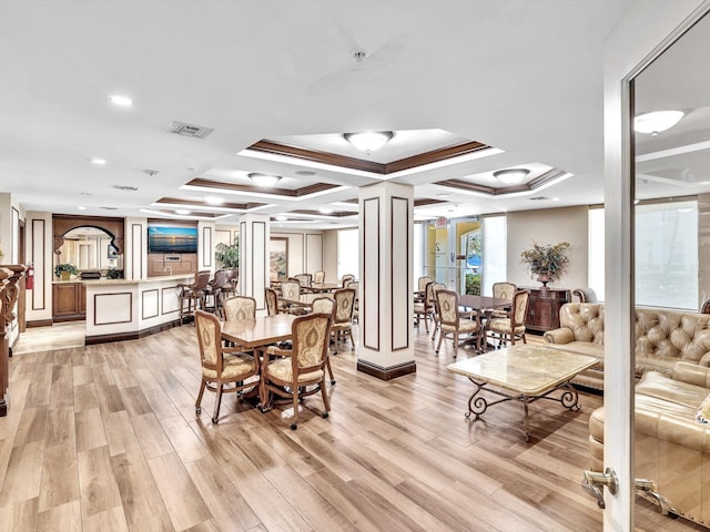 2 Renaissance Way Unit 302, Boynton Beach, FL 33426 - dining space with decorative columns, coffered ceiling, light wood-style floors, and recessed lighting