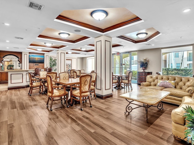 2 Renaissance Way Unit 302, Boynton Beach, FL 33426 - dining space with ornate columns, coffered ceiling, light wood-type flooring, and crown molding