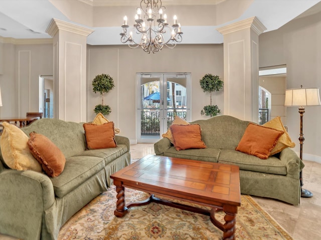 2 Renaissance Way Unit 302, Boynton Beach, FL 33426 - living area with decorative columns, crown molding, a chandelier, and french doors