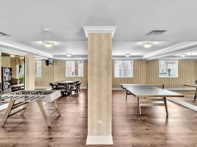 2 Renaissance Way Unit 302, Boynton Beach, FL 33426 - recreation room with ornate columns, wood finished floors, healthy amount of natural light, and crown molding