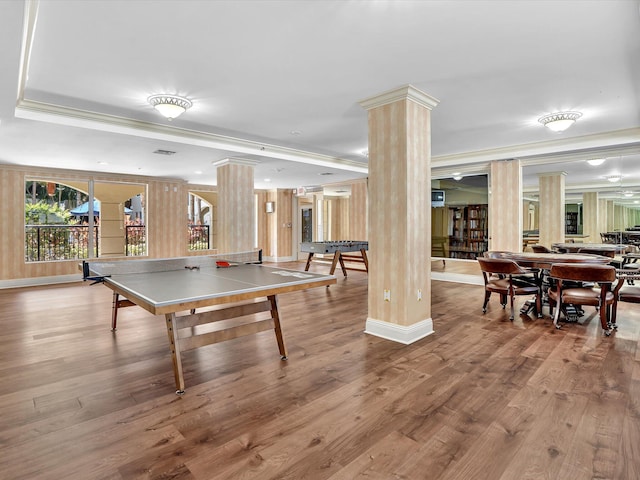 2 Renaissance Way Unit 302, Boynton Beach, FL 33426 - recreation room featuring decorative columns, wood finished floors, and ornamental molding