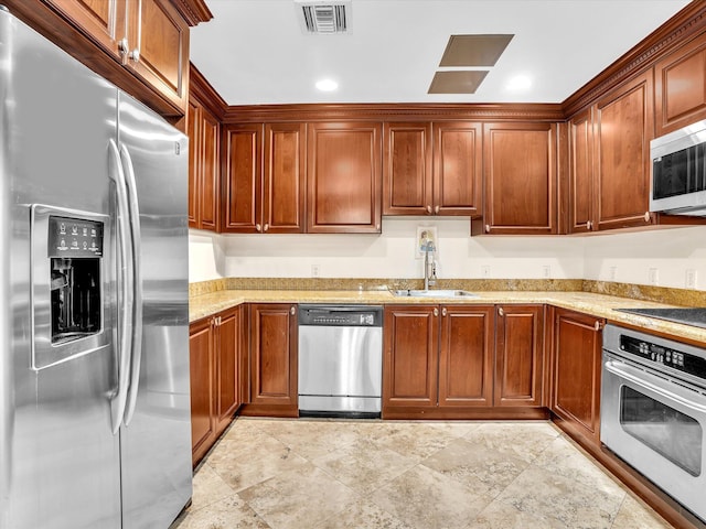 2 Renaissance Way Unit 302, Boynton Beach, FL 33426 - kitchen with stainless steel appliances and light stone counters