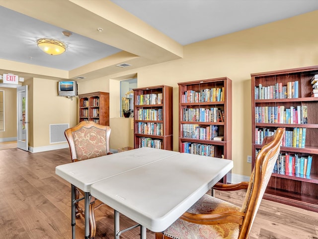 2 Renaissance Way Unit 302, Boynton Beach, FL 33426 - dining space with wood finished floors and baseboards