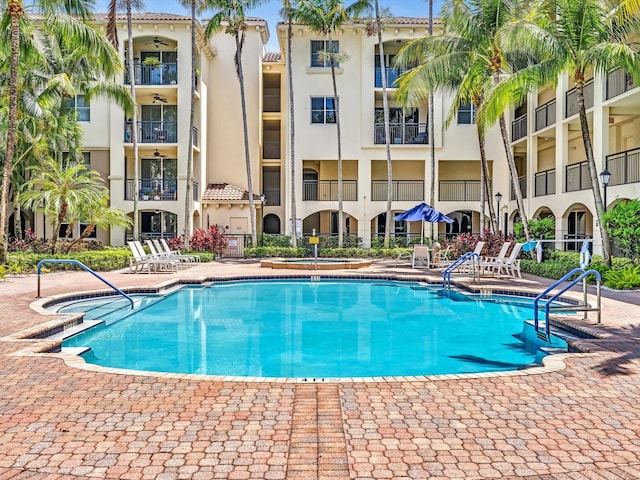 2 Renaissance Way Unit 302, Boynton Beach, FL 33426 - community pool with a patio