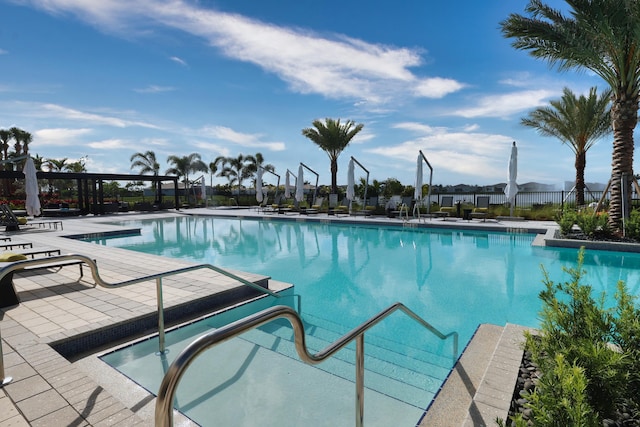 11695 SW Viridian Blvd, Port Saint Lucie, FL 34987 - community pool with a patio