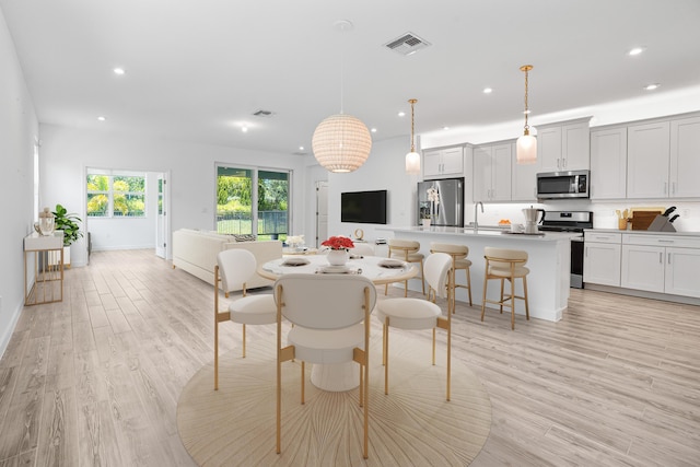 11695 SW Viridian Blvd, Port Saint Lucie, FL 34987 - dining space featuring recessed lighting and light wood-type flooring