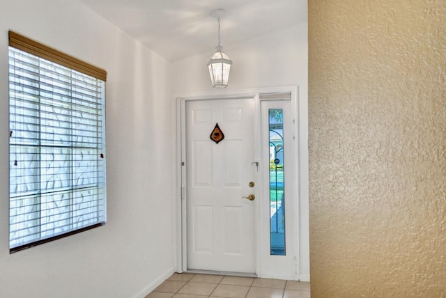 8140 Palm Gate Dr, Boynton Beach, FL 33436 - entrance foyer with light tile patterned flooring and healthy amount of natural light